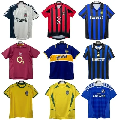 Nine vintage football shirts on hangers, including Arsenal, Inter and Brazil designs